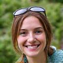 Portrait of Lily Evergreen, a gardening expert specializing in organic growing